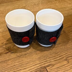 2010 Starbucks White Ceramic Mug with Grey Felt